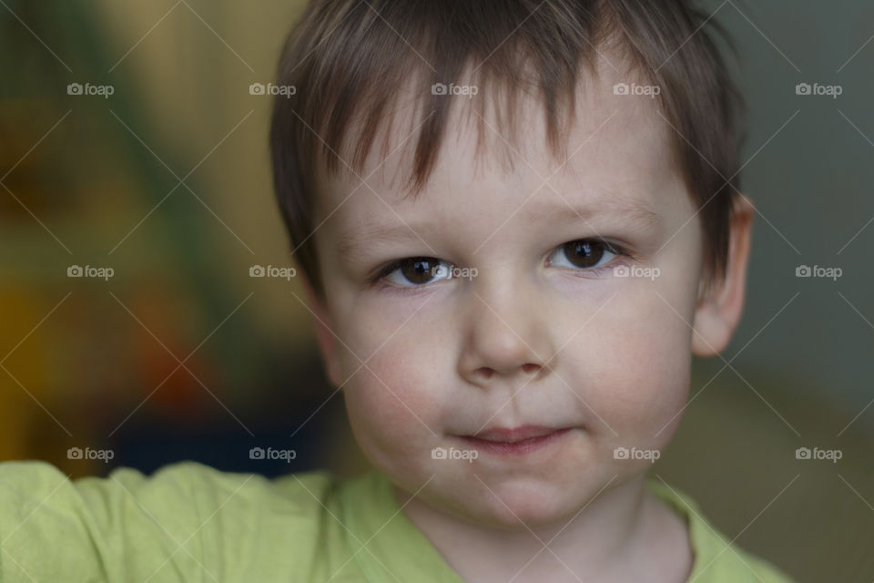 Boy in green shirt