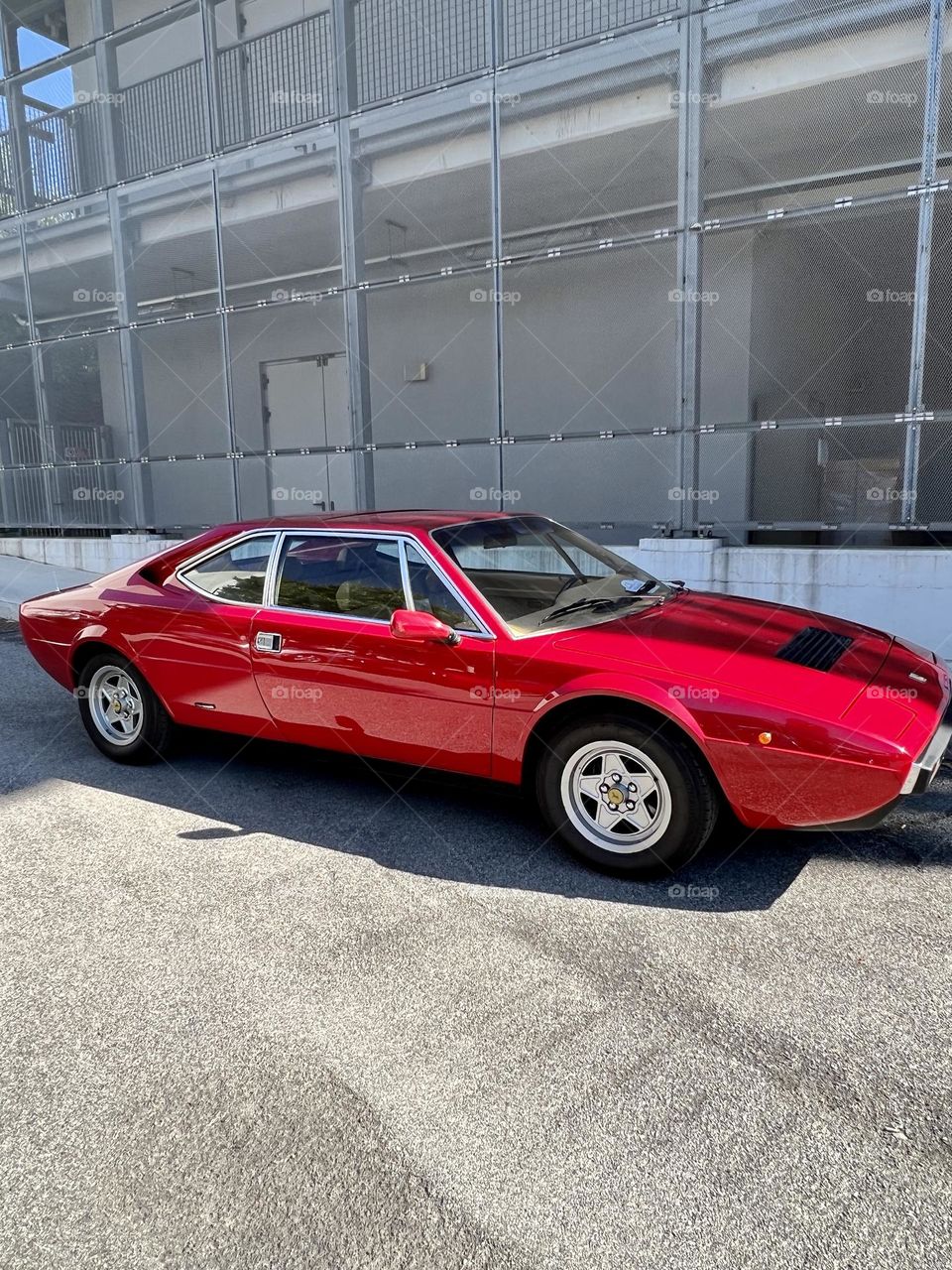 Red old model Ferrari car 