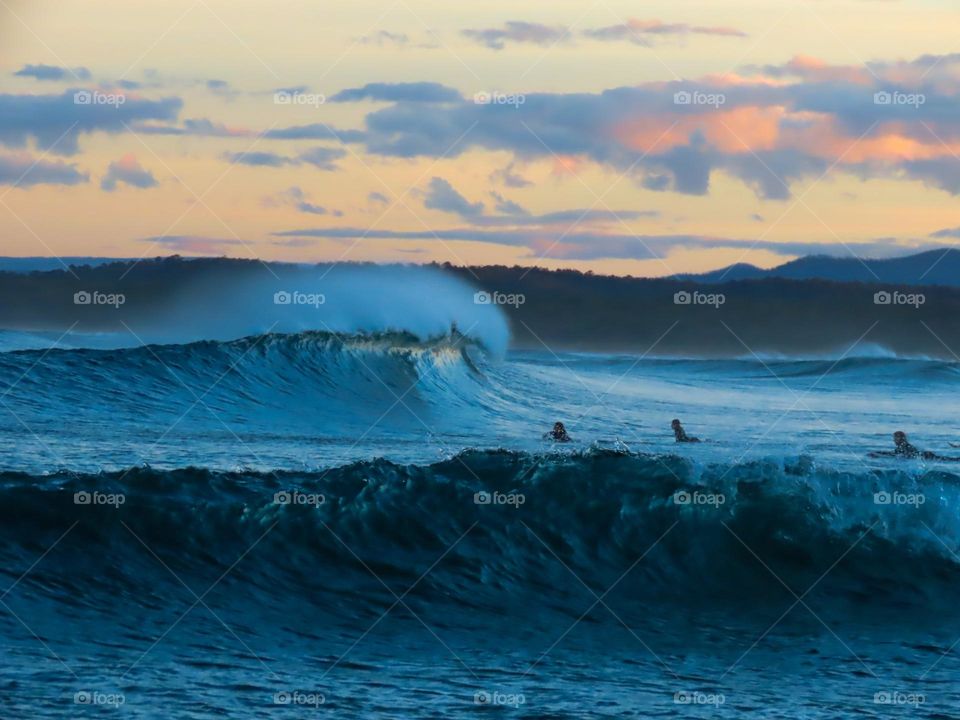 Sunset surfing in Australia