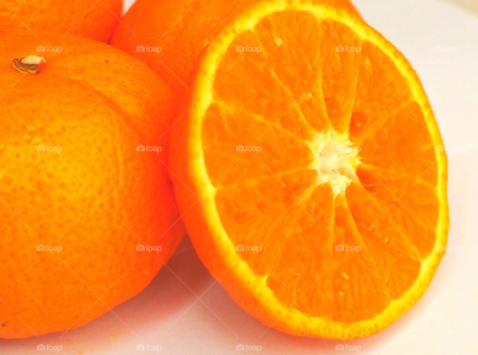 Close up of fresh orange fruit