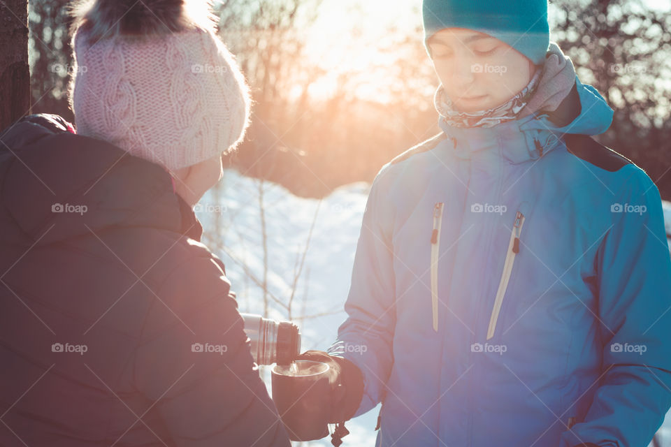 Break for hot drink during the winter trip