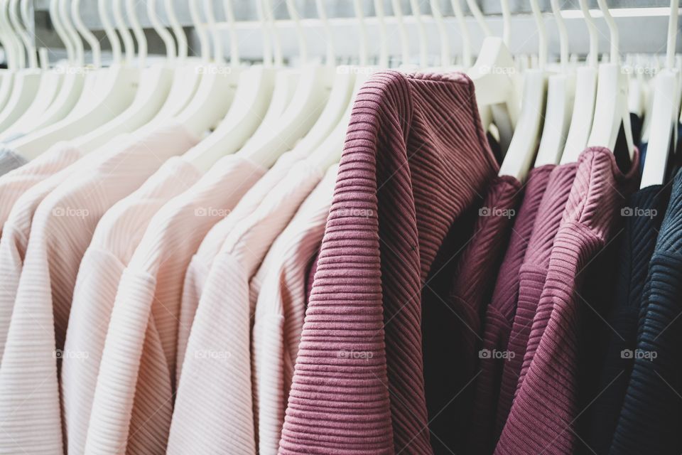 Clothing hanging in a row