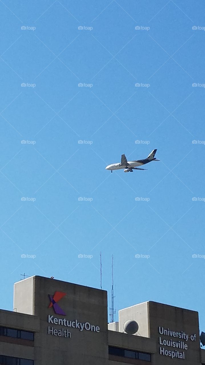 plane flying over head
