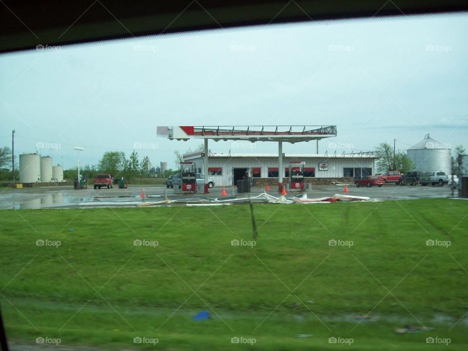 View of gas station through vehicle window