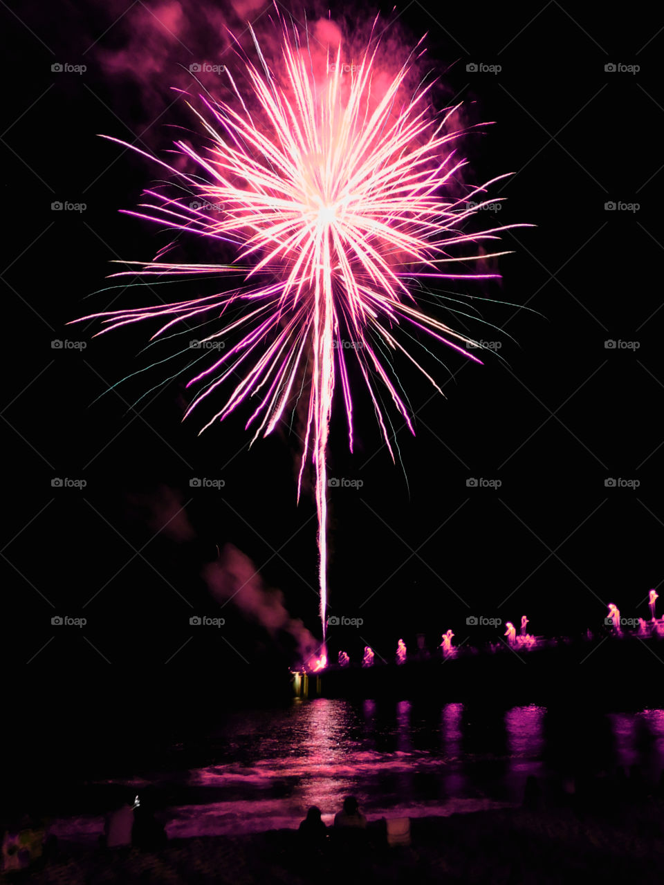 Firework display at night