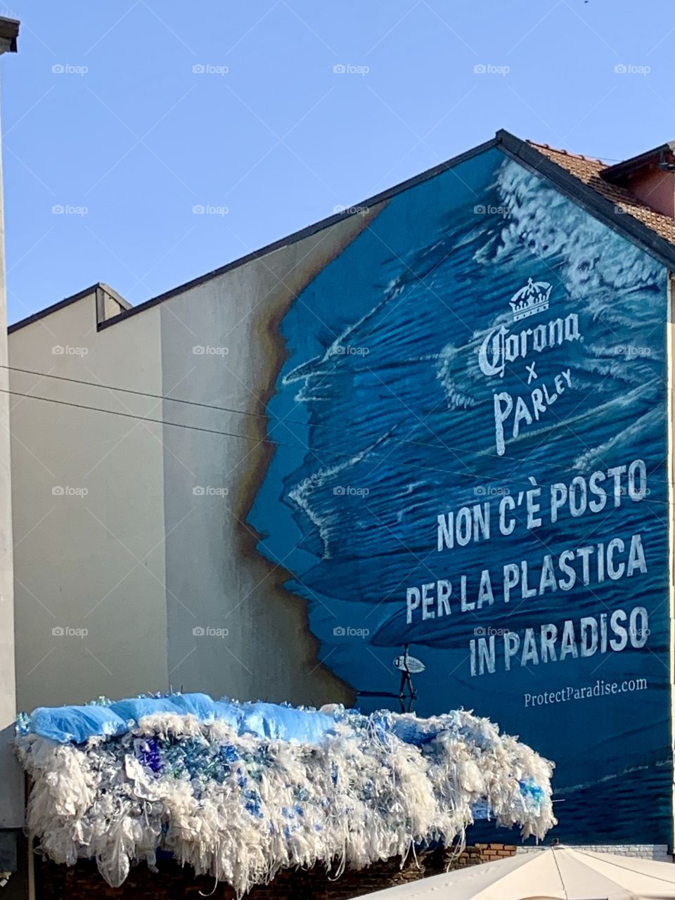 There is no place for plastic in heaven. Corona advertisement. Milan Italy 
