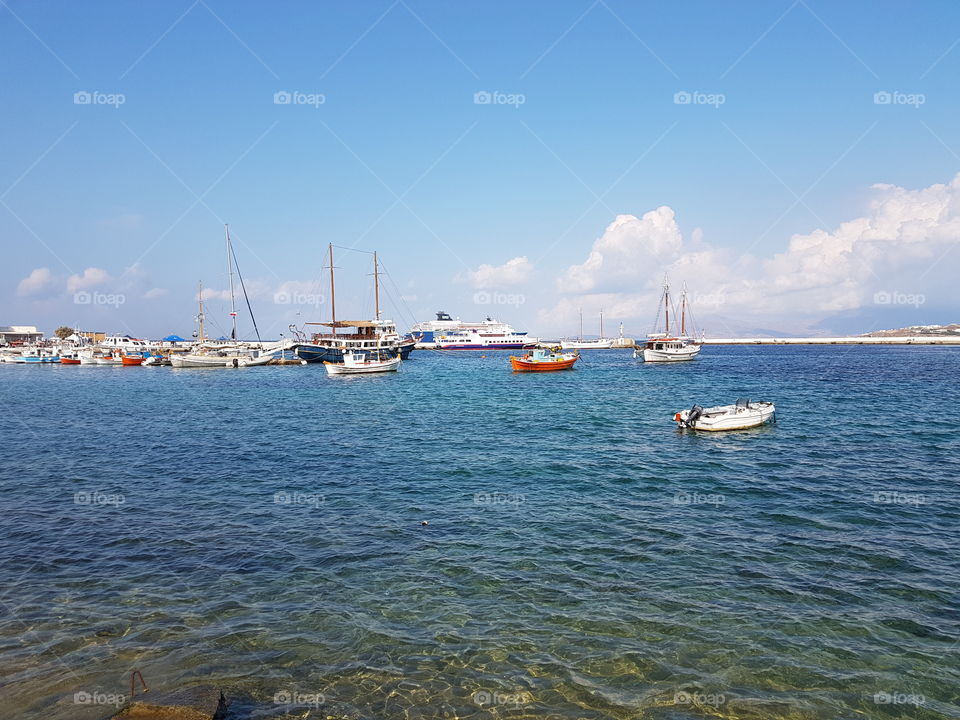 wonderful sky cloud boats mykonos