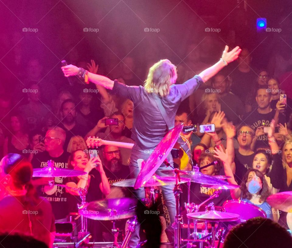 A performer creates a crowd reaction at the end of his performance