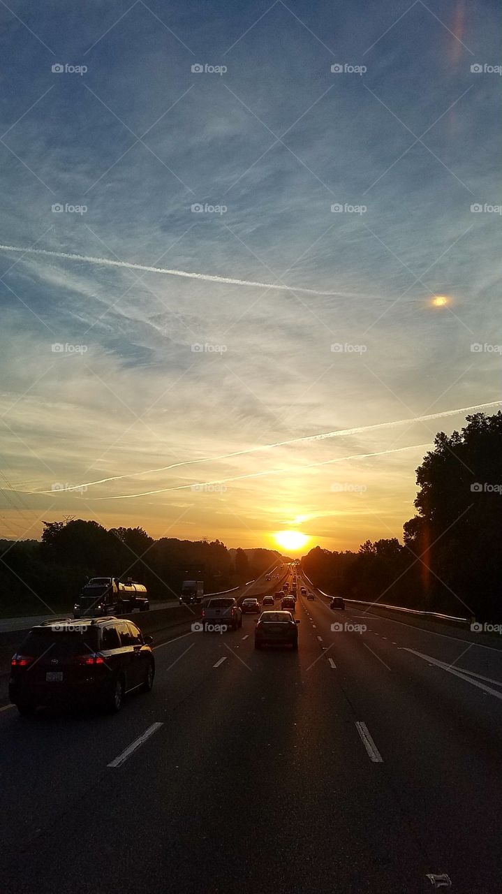 Sunrise with Sky streaks