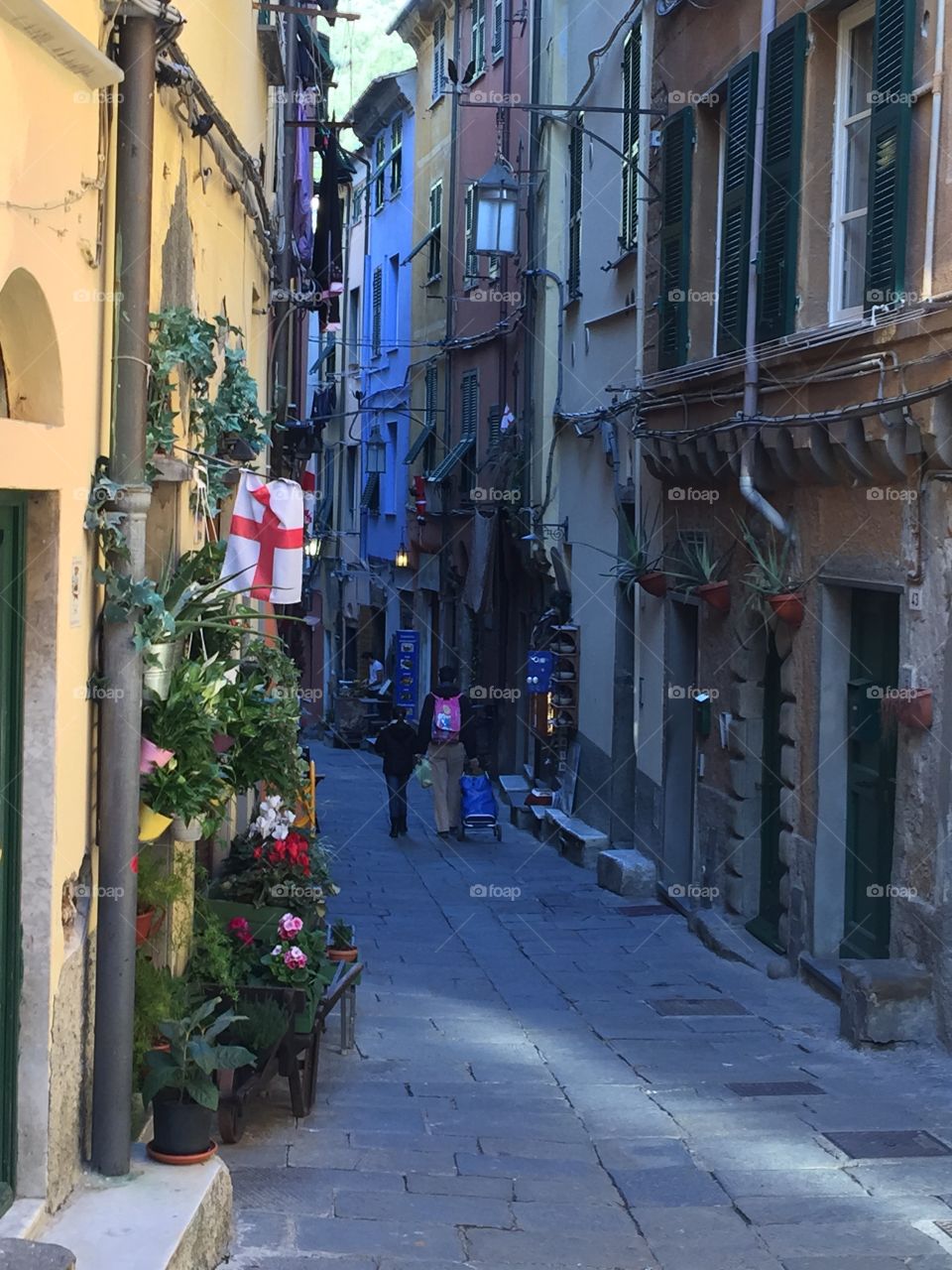 Strolling. Narrow alleyway in Portovenere Italy. 