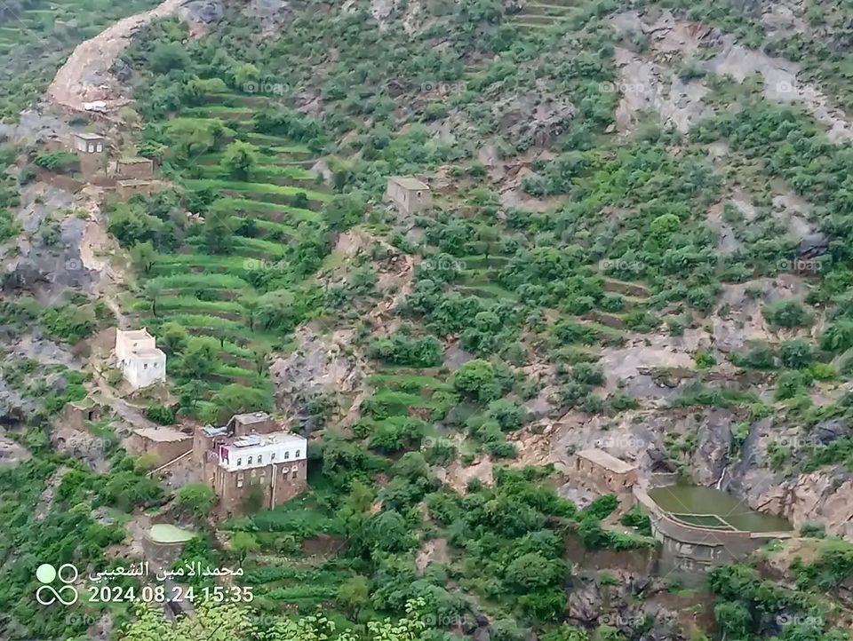 Glory be to God, the magnificent and picturesque view and the natural green trees are a view that is nothing more wonderful than it