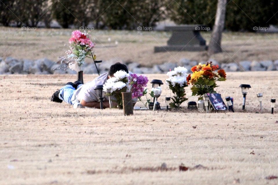 Grieving Father at Gravesite