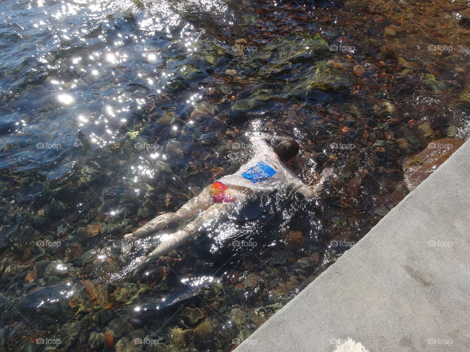 in the sea in Santorin