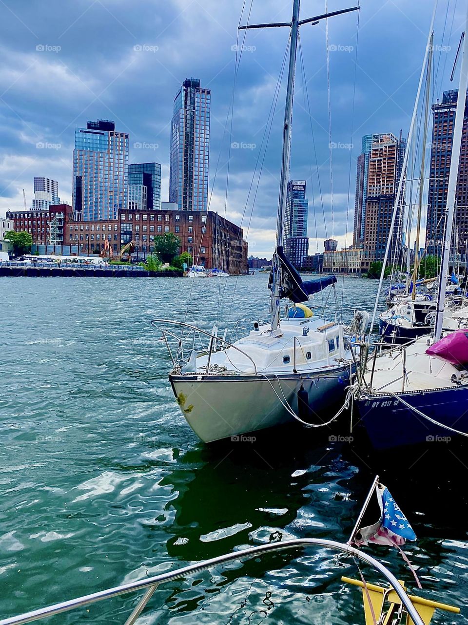 The upcoming waters of the “East River” here at “Newtown Creek” in LIC, Queens are gushing at me, the observer with unmistakable precision and they are sparkling as lively and as clear as can be. 2023. Hypnotic Productions