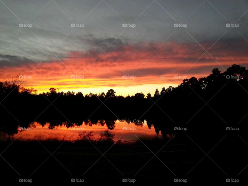 fire in the sky, sunset, reflection, water
