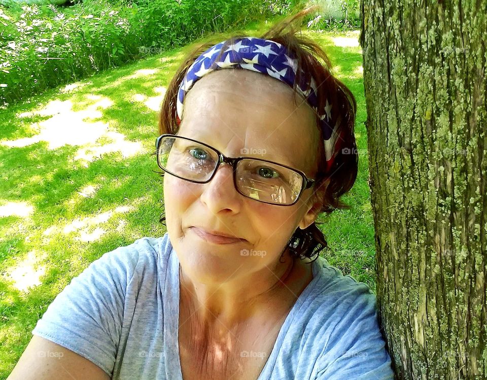 Taking a break after doing yard work.