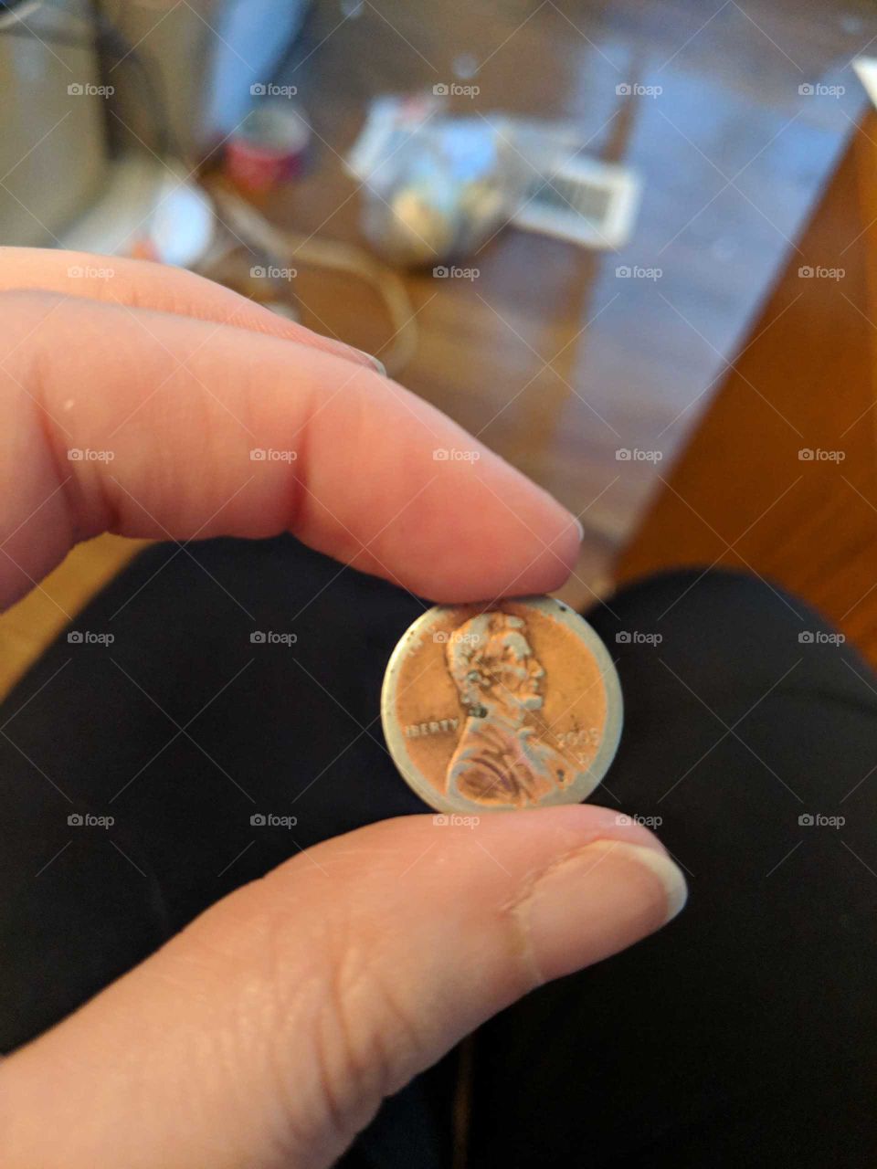 found a penny that had been rubbed down a lot so the inside metal showed