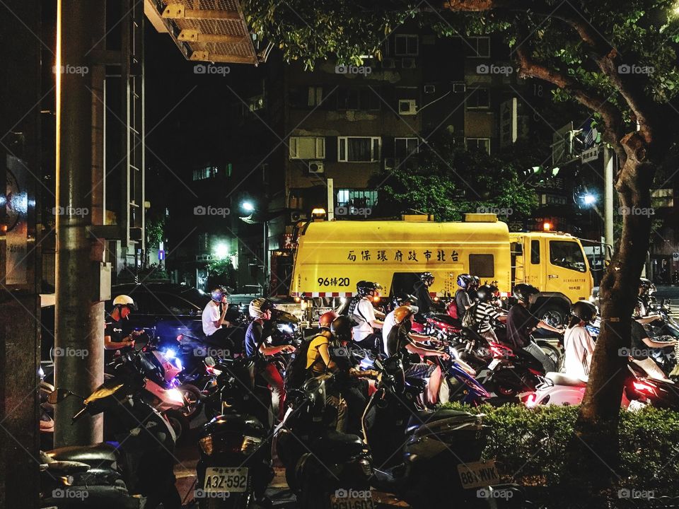 Night riders in the streets of Taipei
