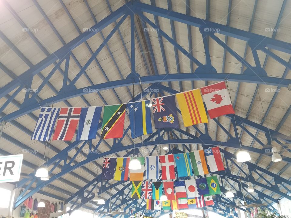 Beautiful flags hung up in a store in St Thomas island