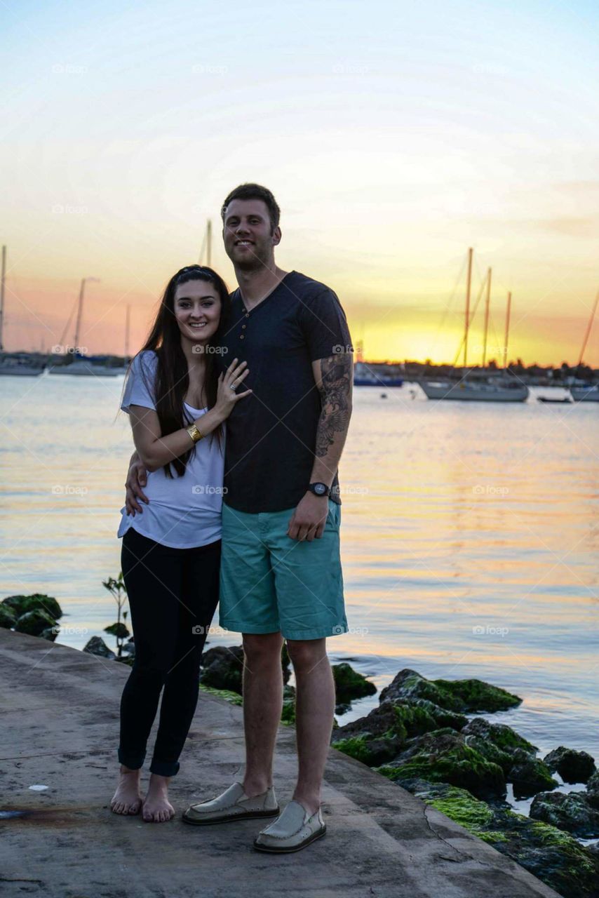 couple at sunset. sunset in Stuart, Florida with loving couple