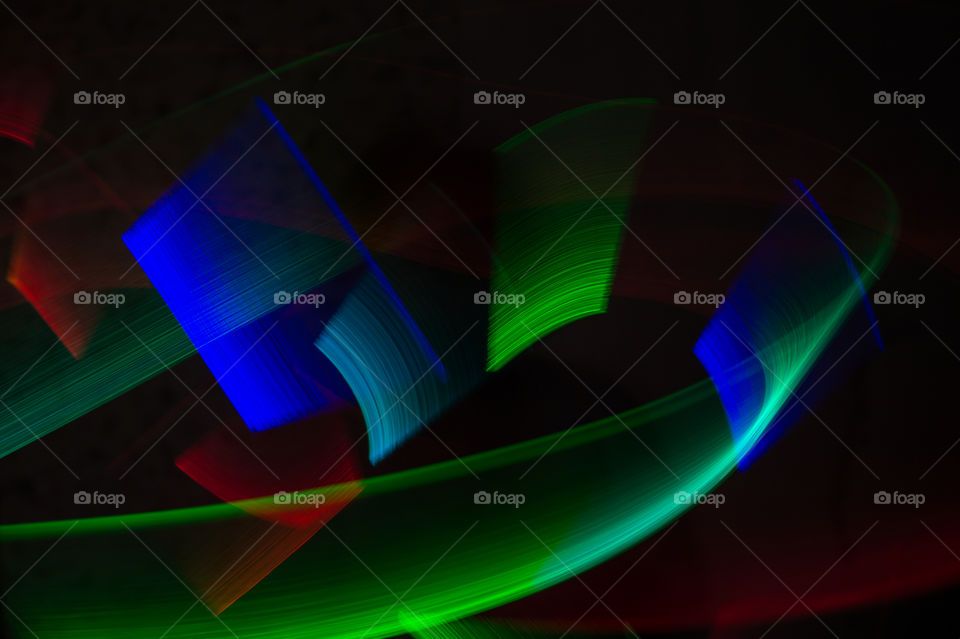 Abstraction painted with light in a dark room at long exposure