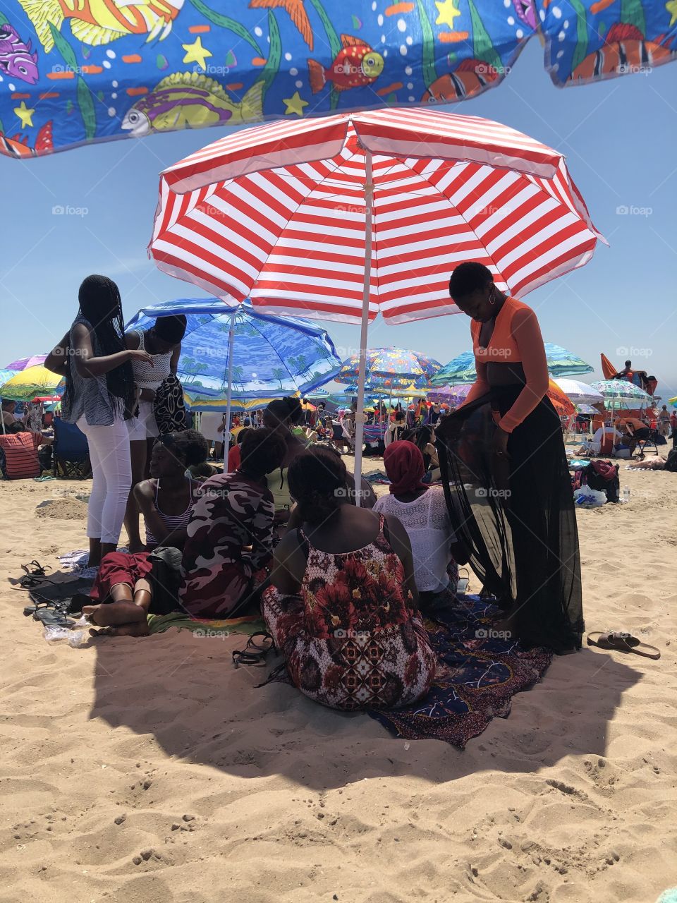 Beautiful African girls enjoy the Coney Island beach 