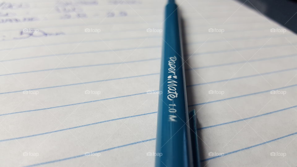 Desktop. Pen & paper on desktop...