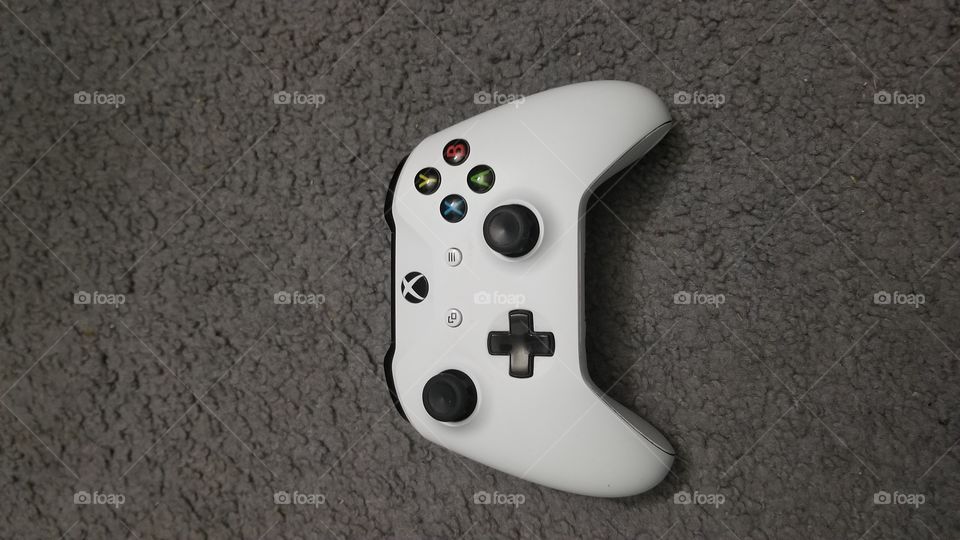 just a simple clean image of an Xbox One S controller