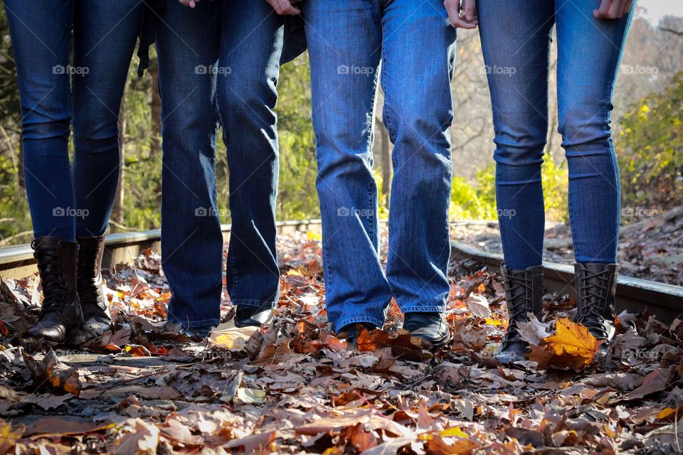 Human legs on railway track