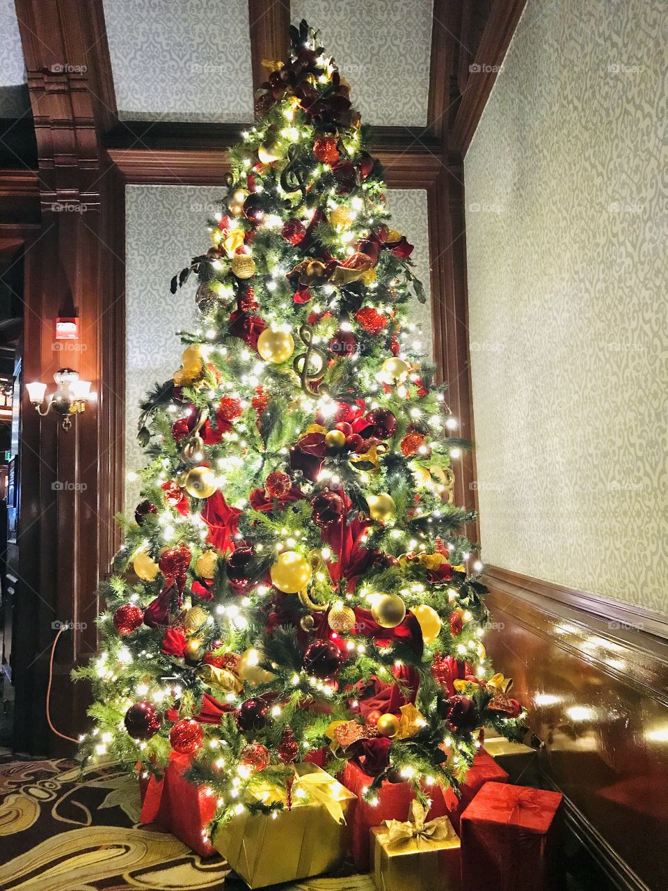Beautiful Victorian tree put up golden merry and bright