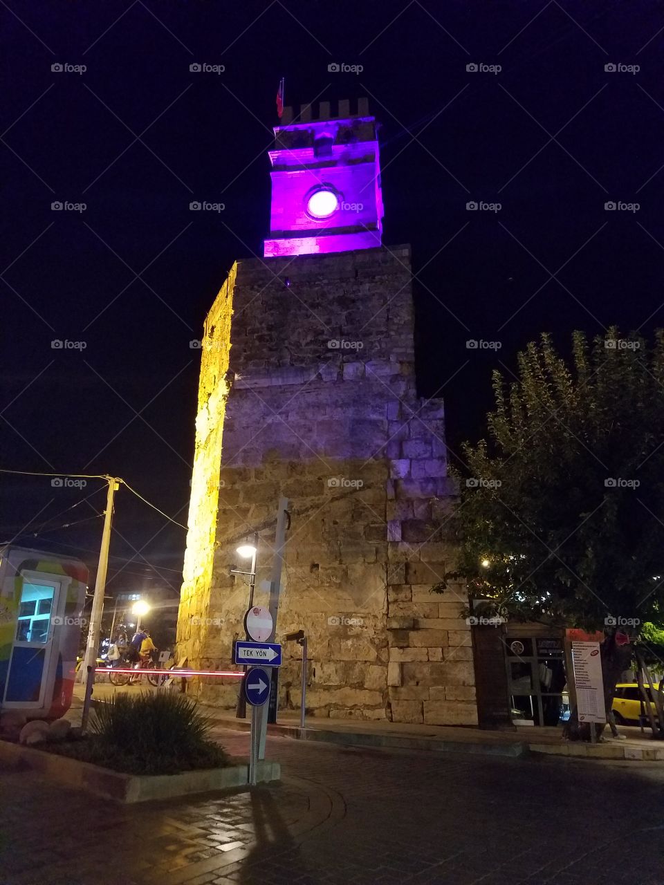 ancient clock tower overlooking old town antalya turkey