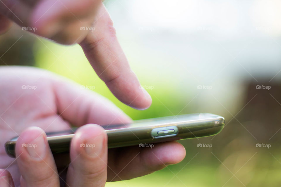 man hand with smartphone