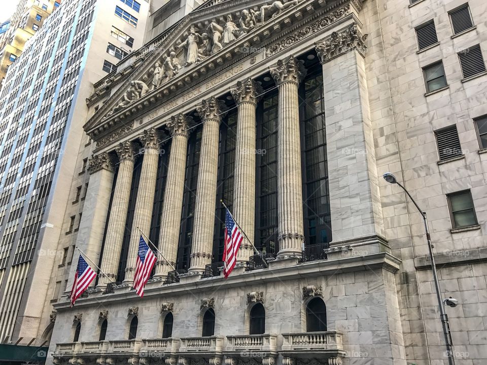 The American flags at the Wall Street building