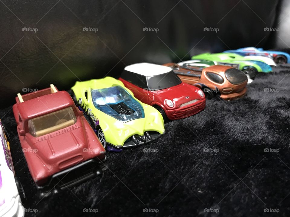 Toy cars in a row