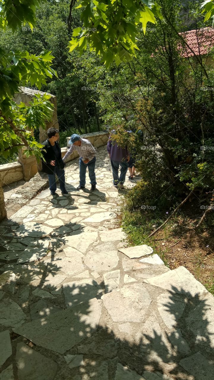 Elderly people ascending a path in St Vlasios,Korinthia