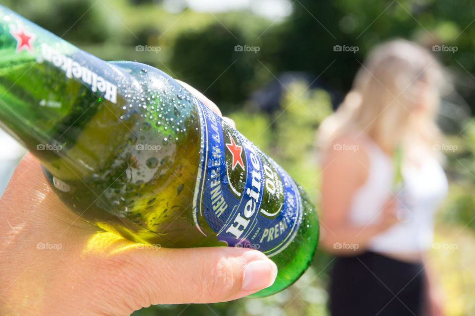 Having a cold Heineken on a sunny day 