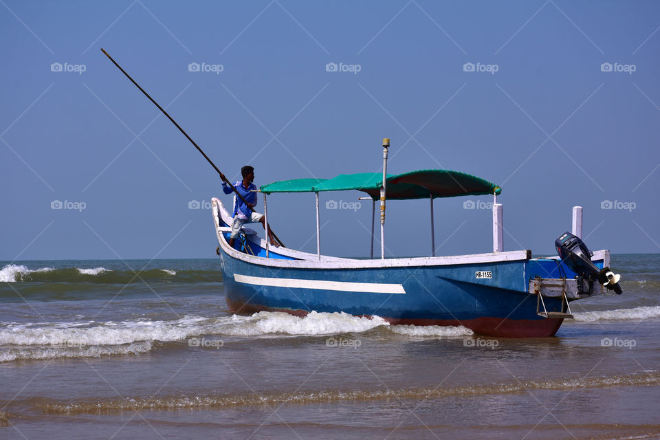 fisherman boat in the sea beach