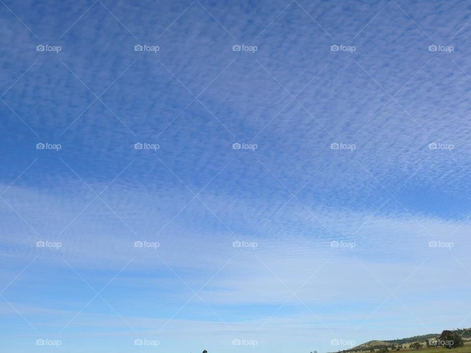 Blue Skies Whispy Clouds