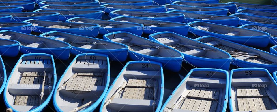 Boats moored at harbor