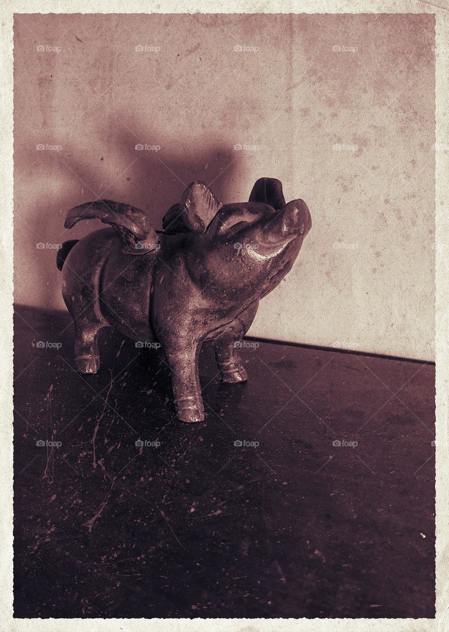 If pigs could fly!!! This happy winged bronze piggie bank is a true vintage piece as I’ve had her for 40 plus years. Sepia colour and editing effects make the vintage photo effect complete!