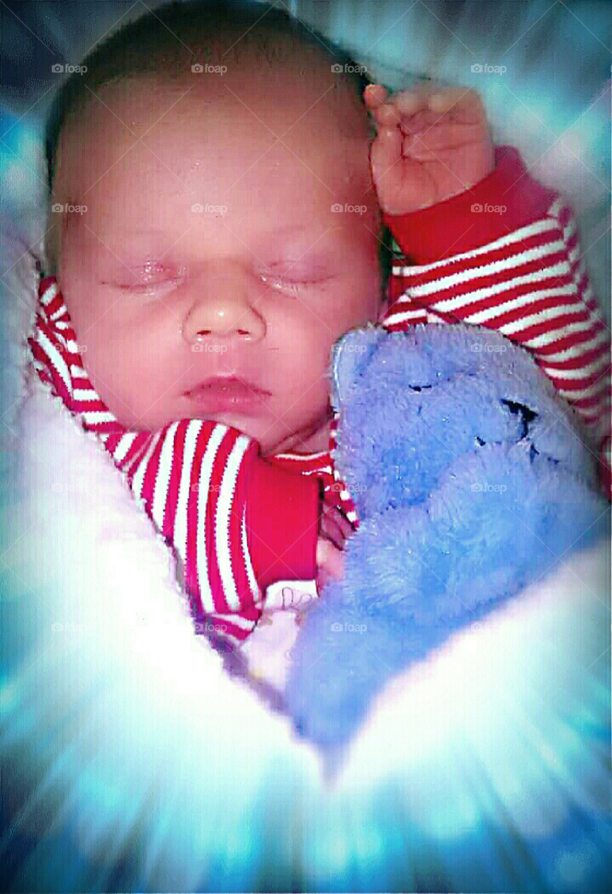 Newborn Cuddles With Mr. Berry