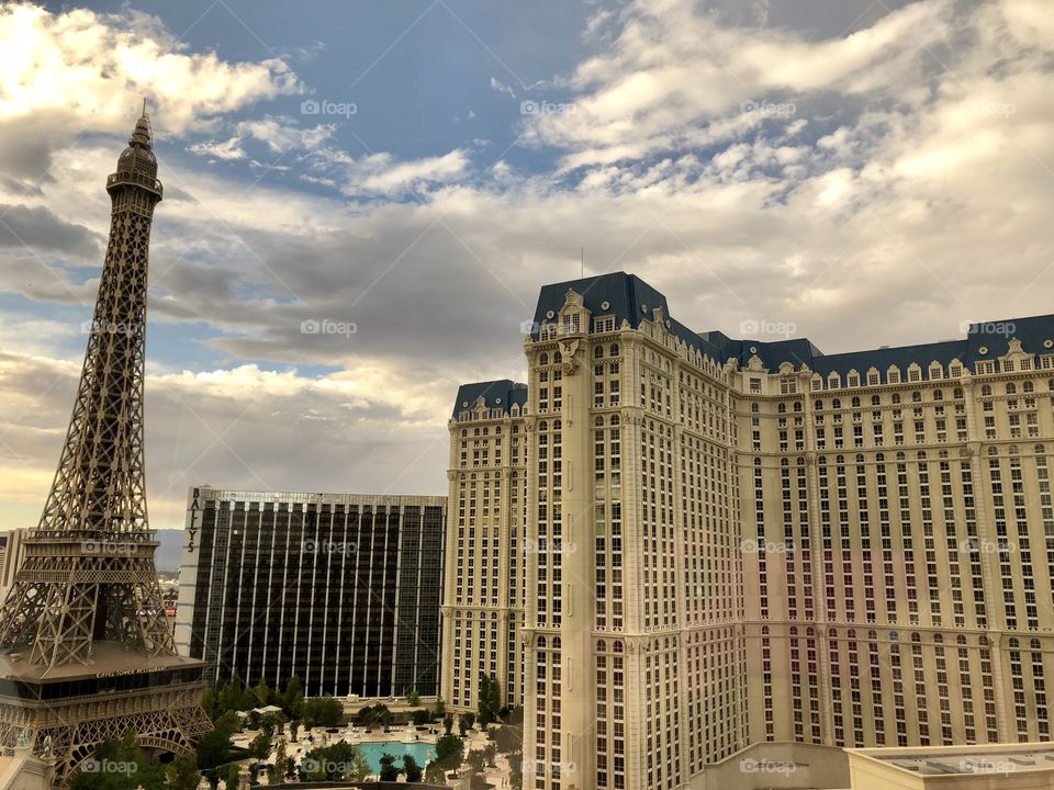 Las Vegas skyline including Paris Hotel pool from Planet Hollywood Hotel windows.