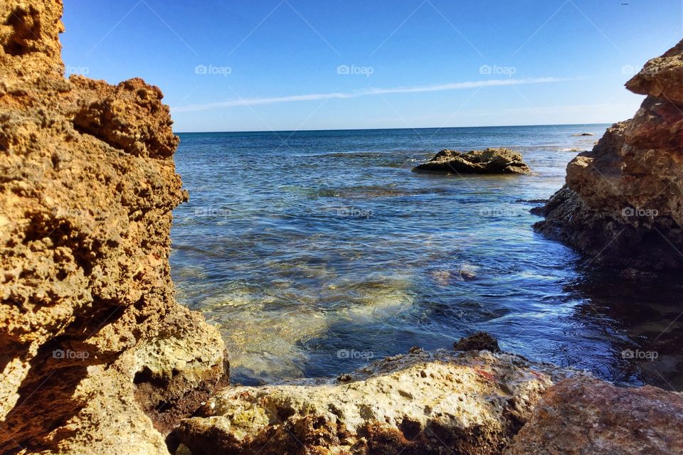 Clear sea by the cliffs