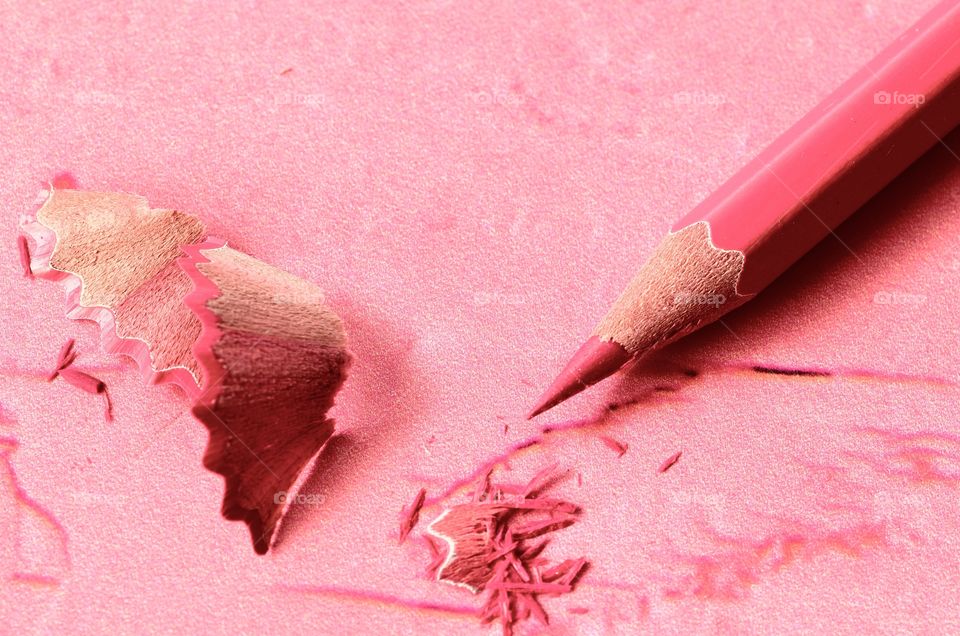 Pink coloured pencil after sharpening