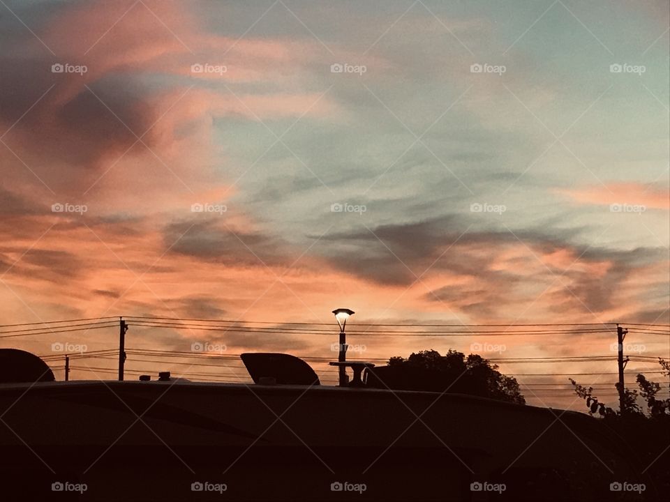 Good Early Morning Can You Here the Crack Of Dawn. Beautiful Green Hues Some Yellows, Oranges,Pinks turning to Dark Hues just making Sunrise More Special.