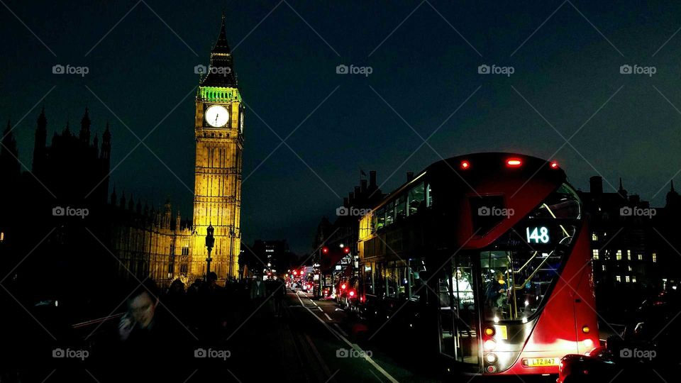 Bus passing by Big Ben in London