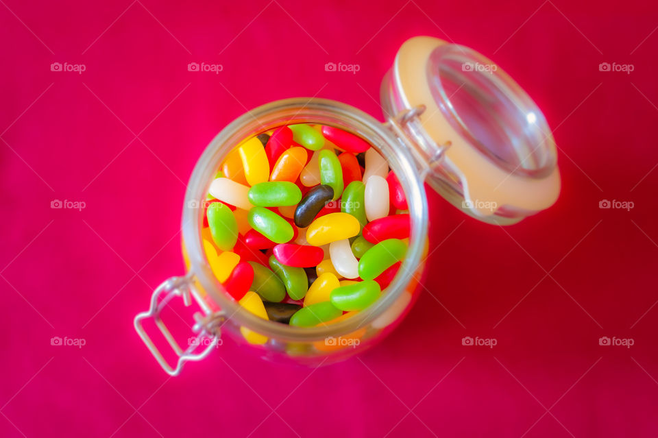 A jar full of jelly beans.