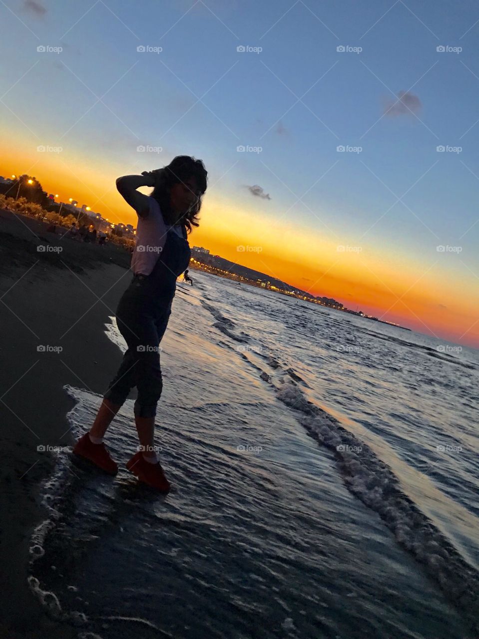 It’s a photo of sunset beside black sea 