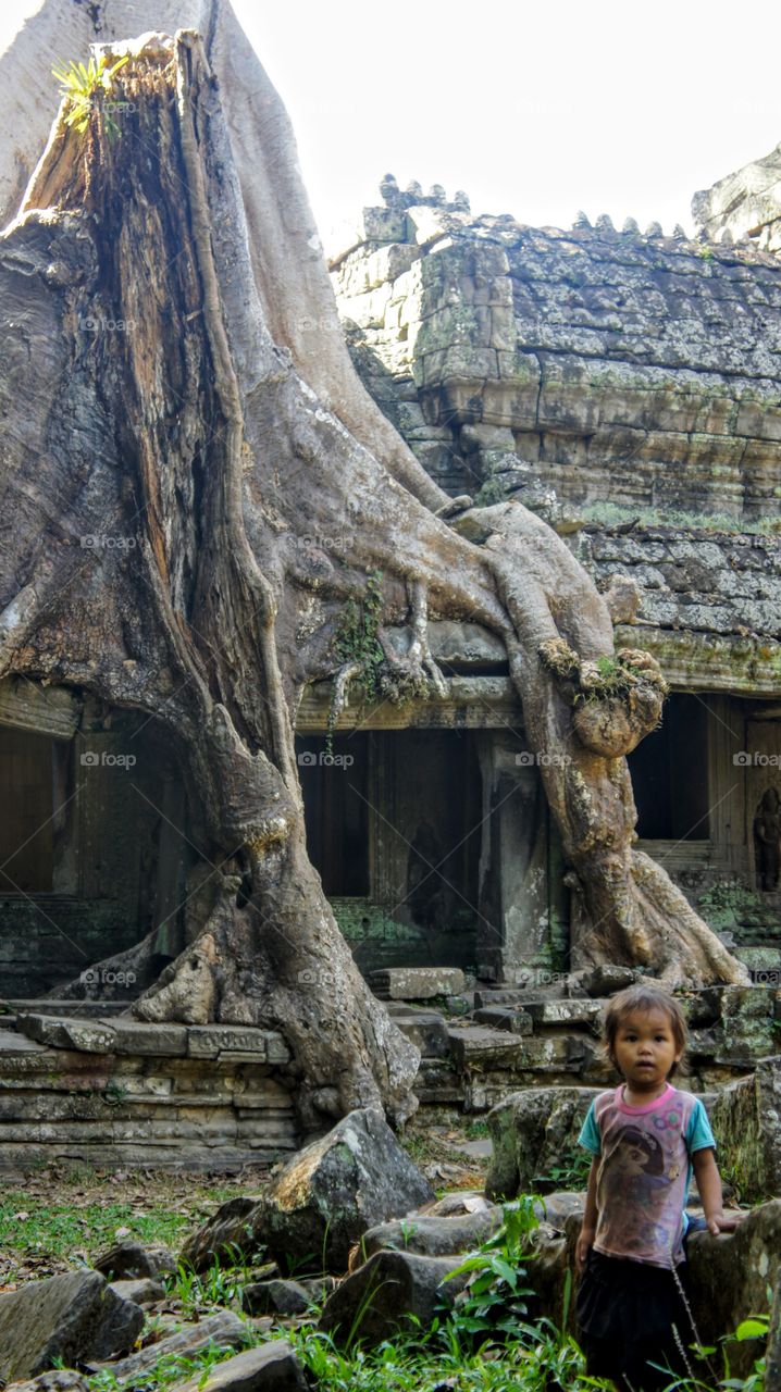 Child plays at ancient temple