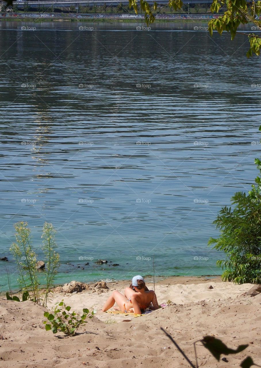 girl on the beach of the Dnieper river